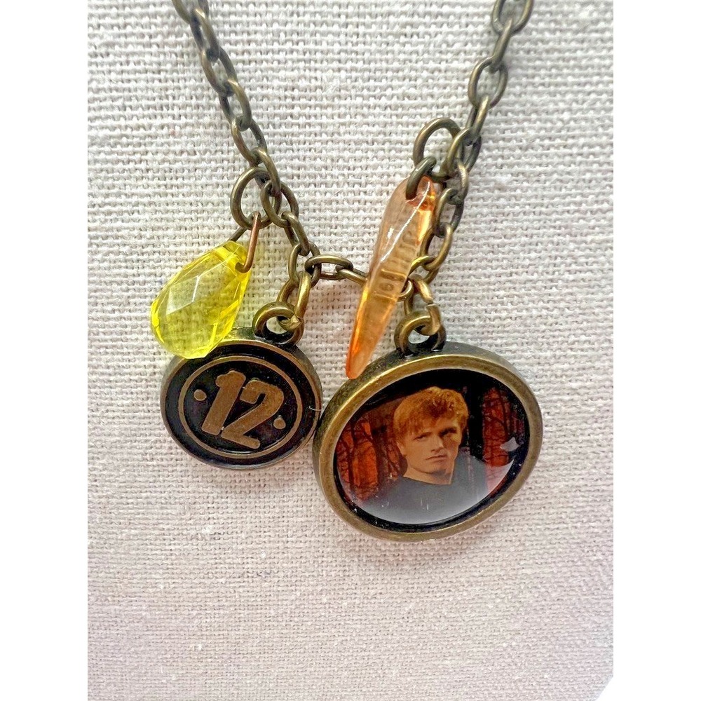 Hunger Games Necklace Peeta Medallion District 12 Official Lionsgate Official - Picture 6 of 14
